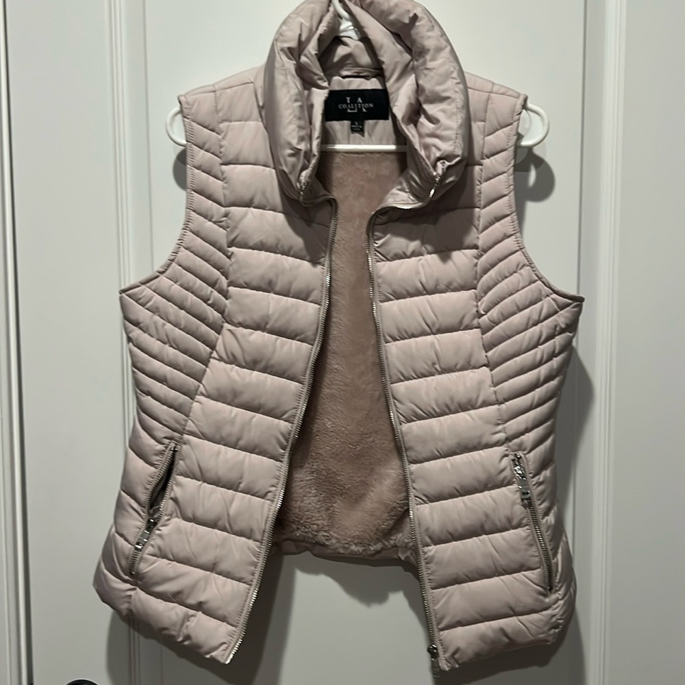LA Coalition Faux fur lined puffer vest. Cozy and stylish